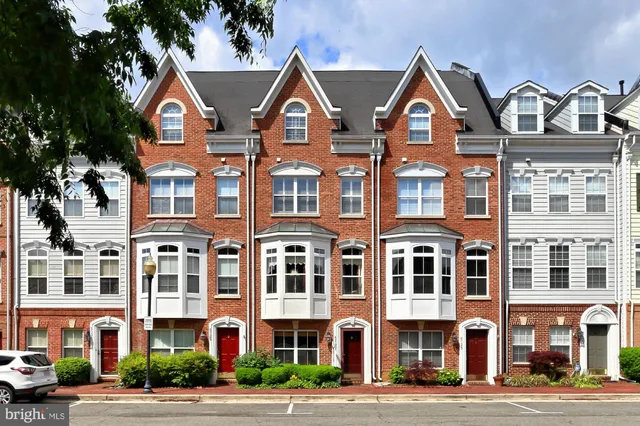 a front view of a building with street view