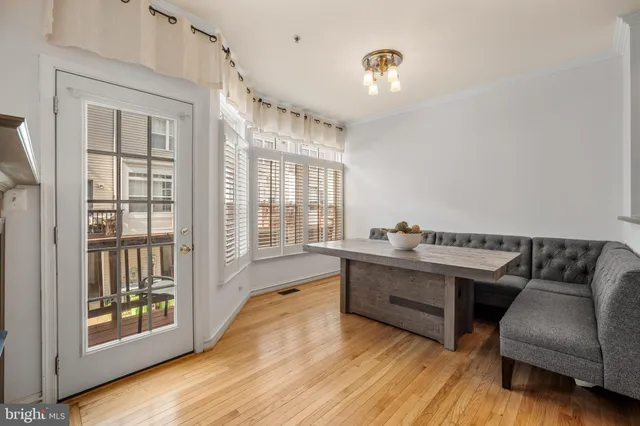 a room with furniture and a wooden floor