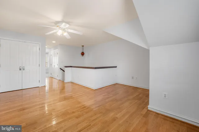 a bedroom with bed and window