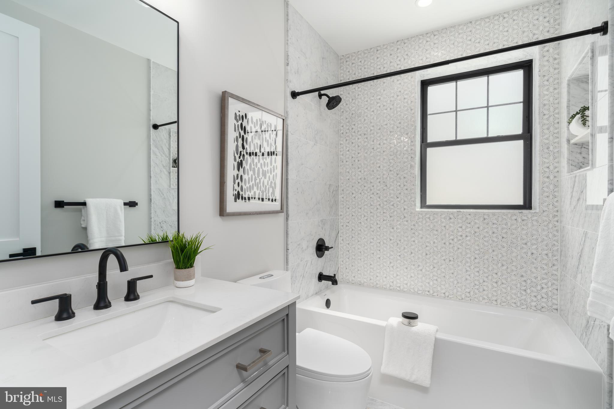 910 8th Street Northeast Washington, DC 20002 - Photo 36 of 62 All MARBLE baths