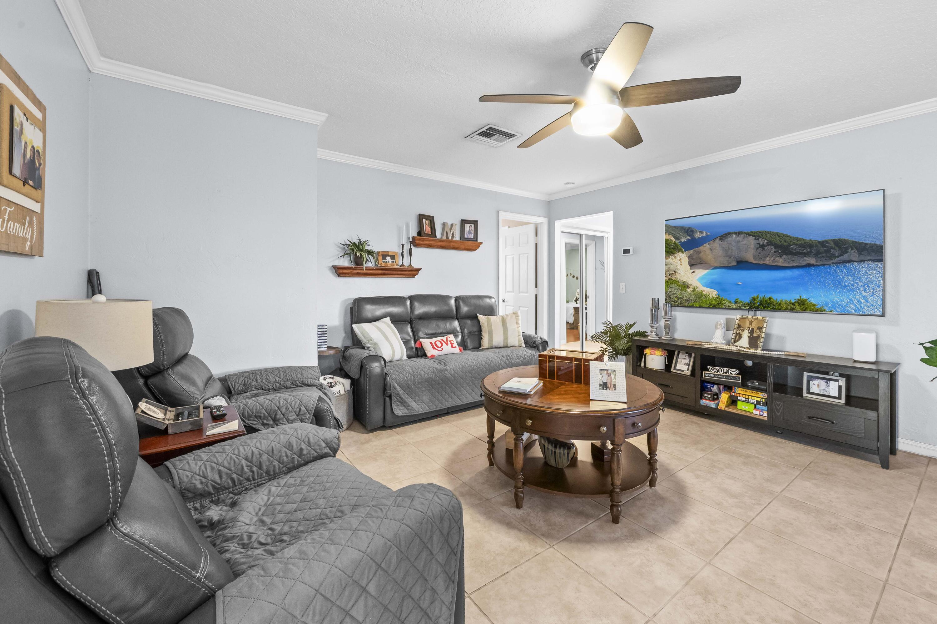 6427 Travis Road Lake Clarke Shores, FL 33406 - Photo 13 of 32 28 Family Room 01