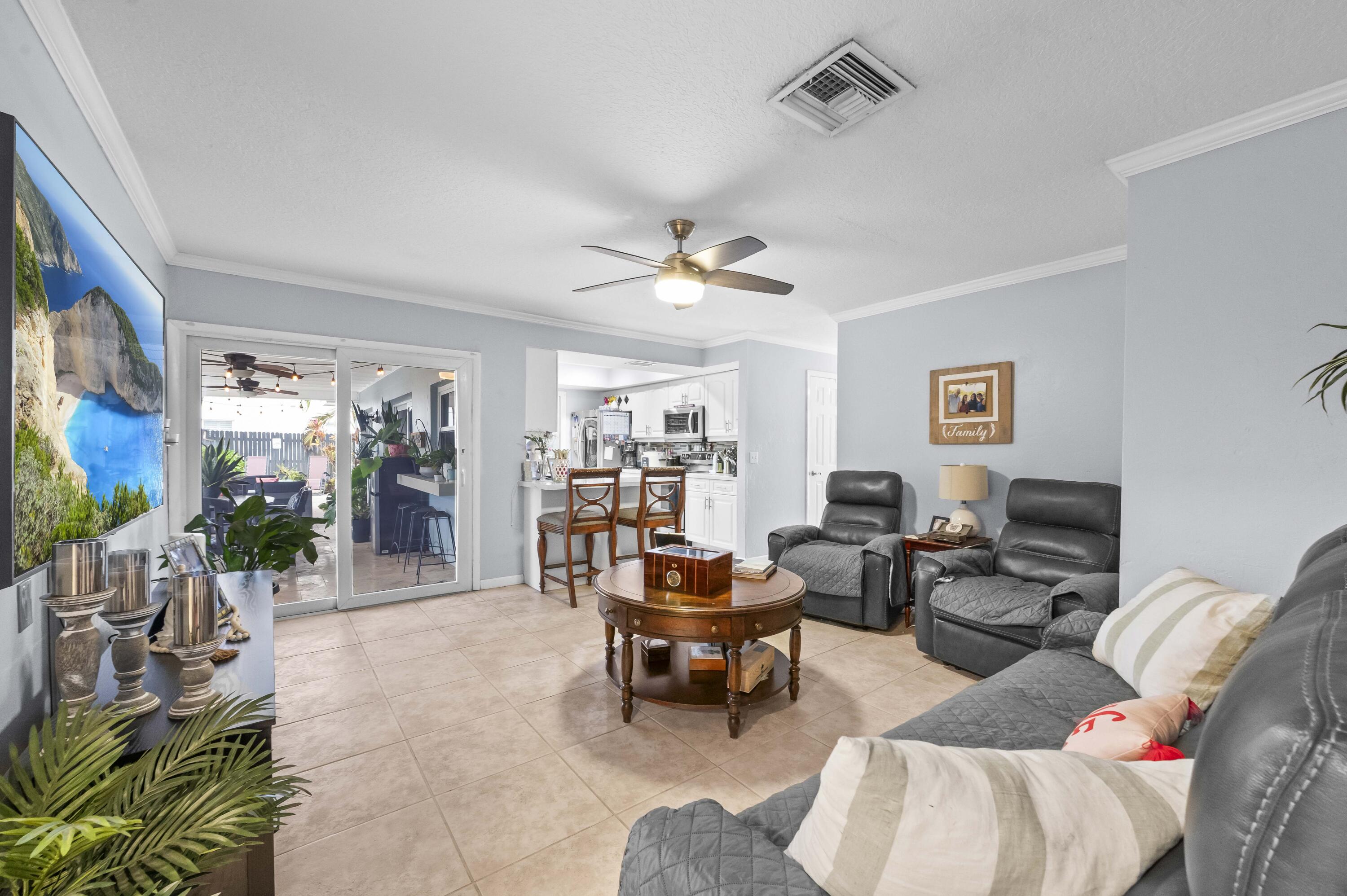 6427 Travis Road Lake Clarke Shores, FL 33406 - Photo 14 of 32 30 Family Room 03