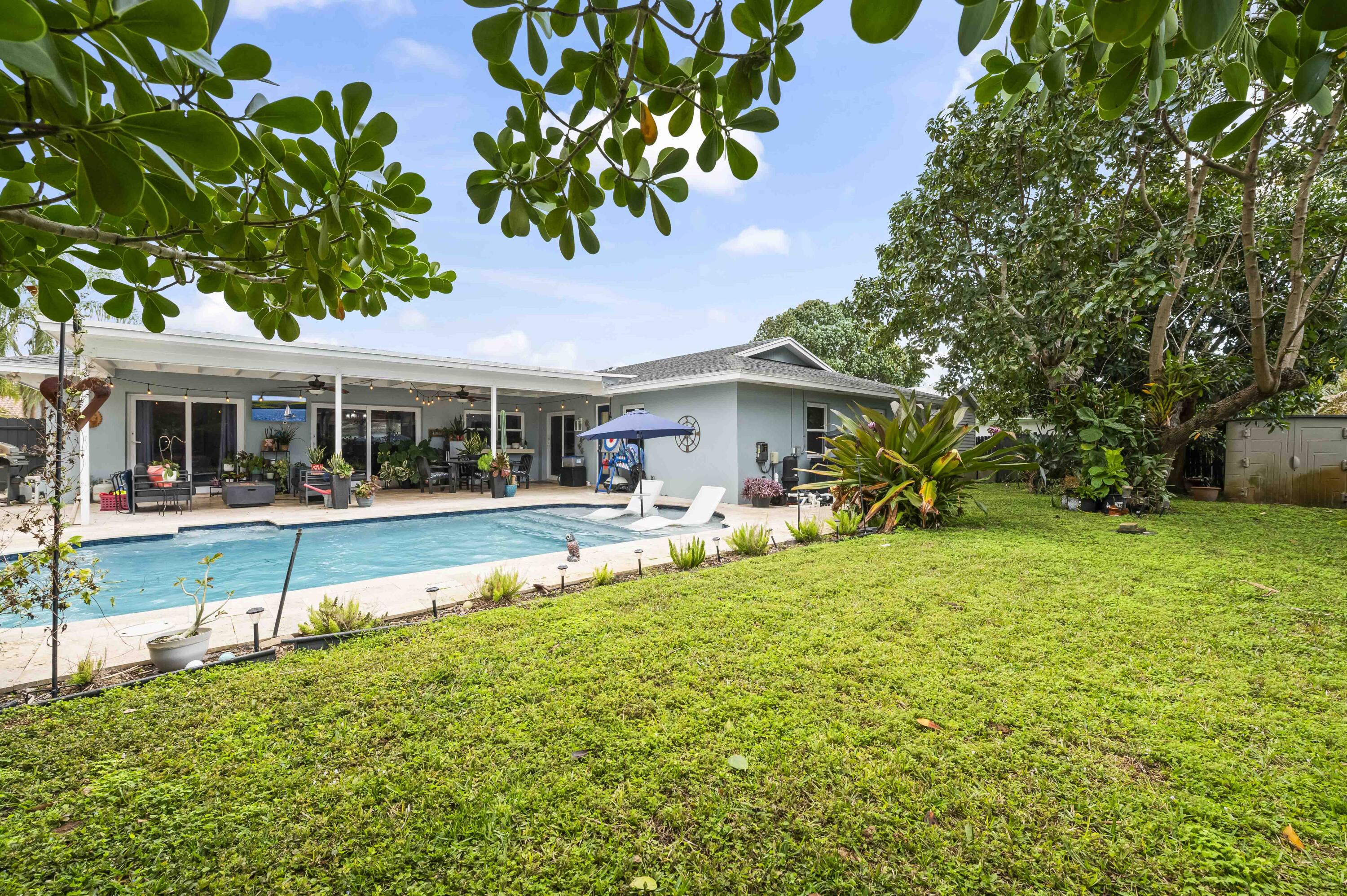 6427 Travis Road Lake Clarke Shores, FL 33406 - Photo 19 of 32 43 Rear 01