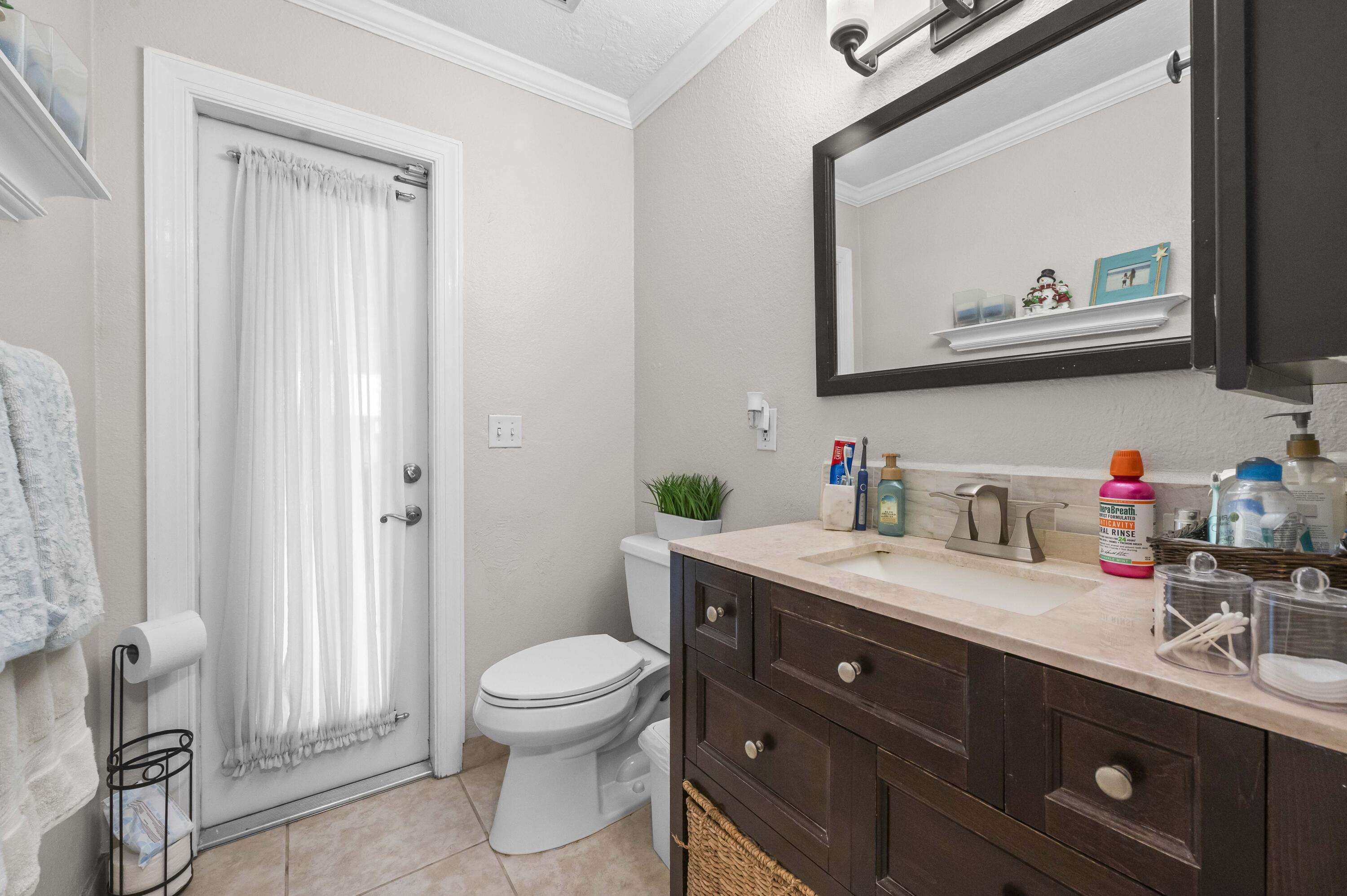 6427 Travis Road Lake Clarke Shores, FL 33406 - Photo 26 of 32 25 Bathroom 01