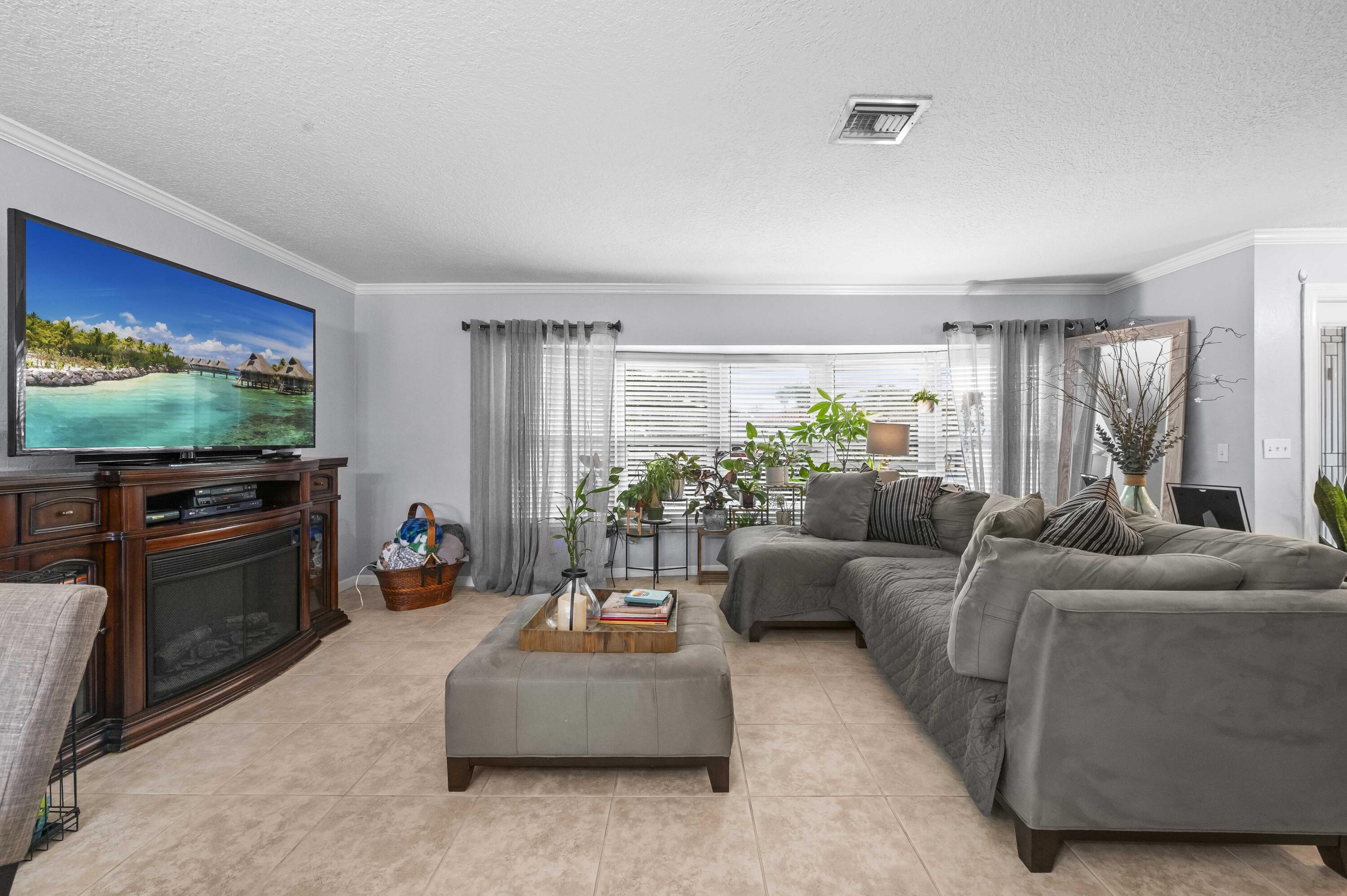 6427 Travis Road Lake Clarke Shores, FL 33406 - Photo 6 of 32 08 Living Room 03