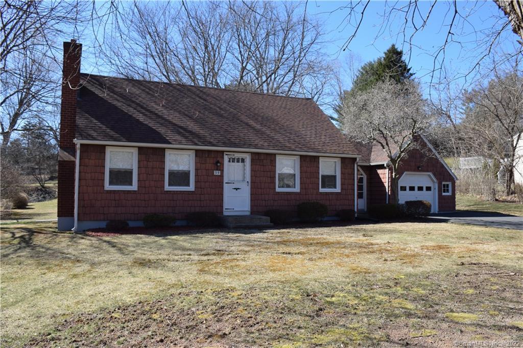 39 Jones Road Wallingford, CT 06492 - Photo 1 of 1 a house that has a tree in front of it