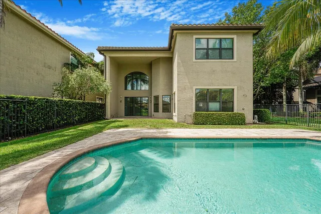 a view of swimming pool with a garden