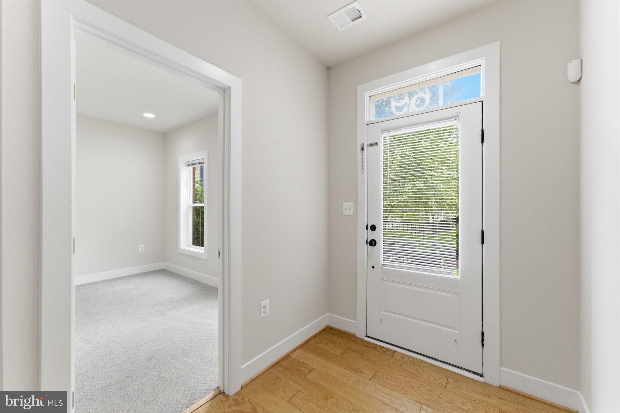 169 Kandinsky Loop Silver Spring, MD 20906 - Photo 6 of 67 Bright and inviting entryway space.