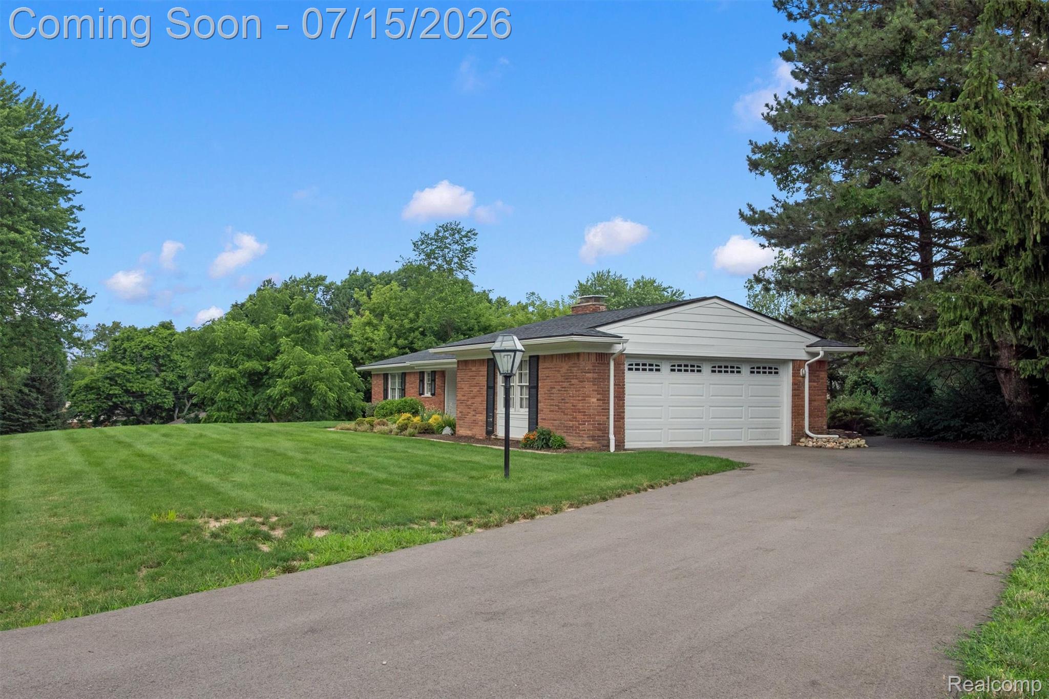 1151 Peveril Road Bloomfield Hills, MI 48304 - Photo 34 of 39 Large, new double wide driveway and a
a new white garage door with remotes