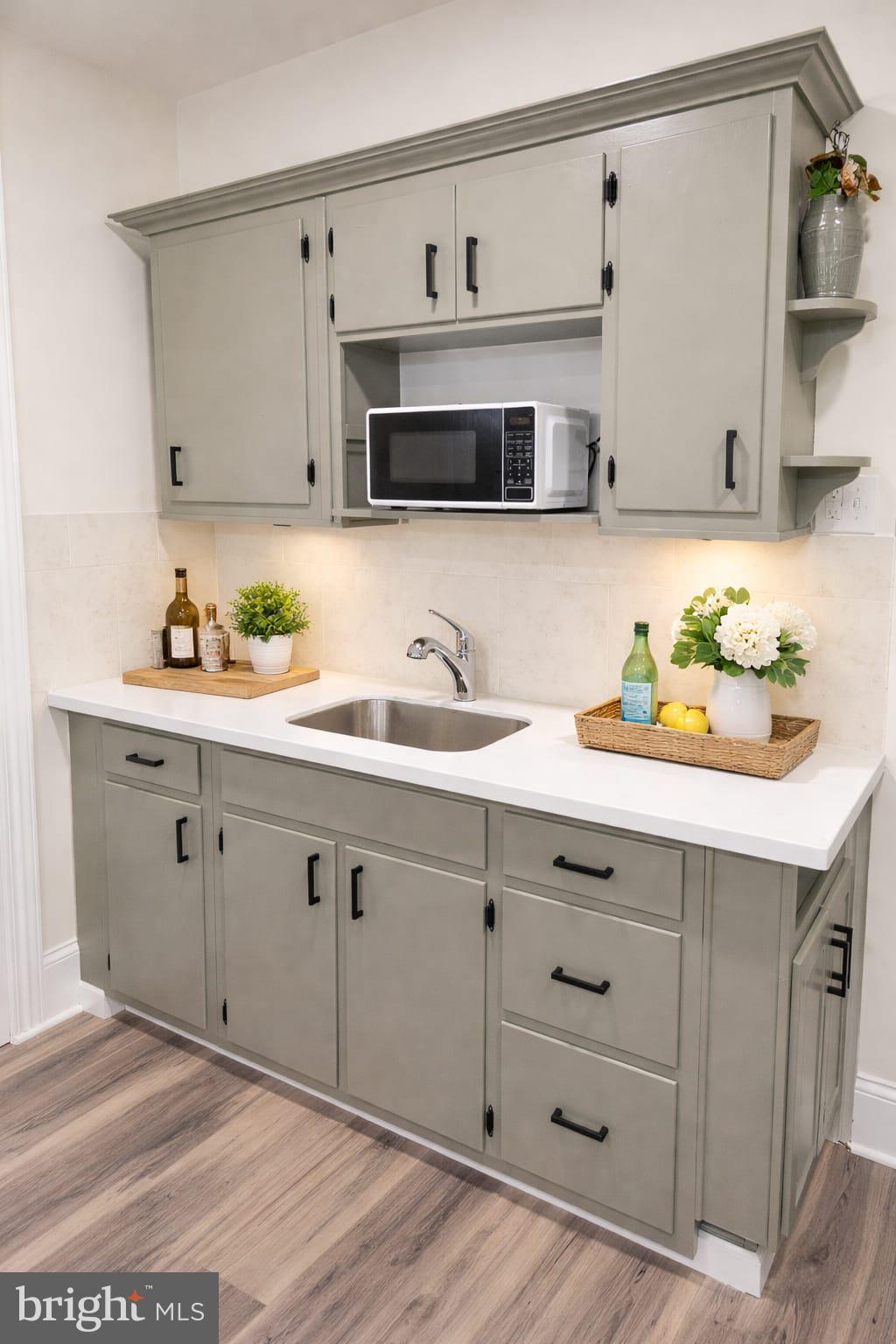 30 Front Street Mohnton, PA 19540 - Photo 6 of 29 a kitchen with stainless steel appliances a sink and cabinets