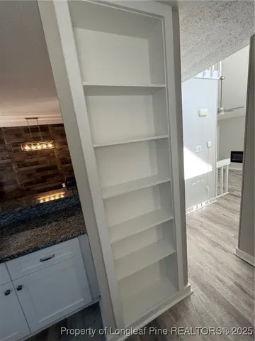 a refrigerator freezer sitting inside of a kitchen