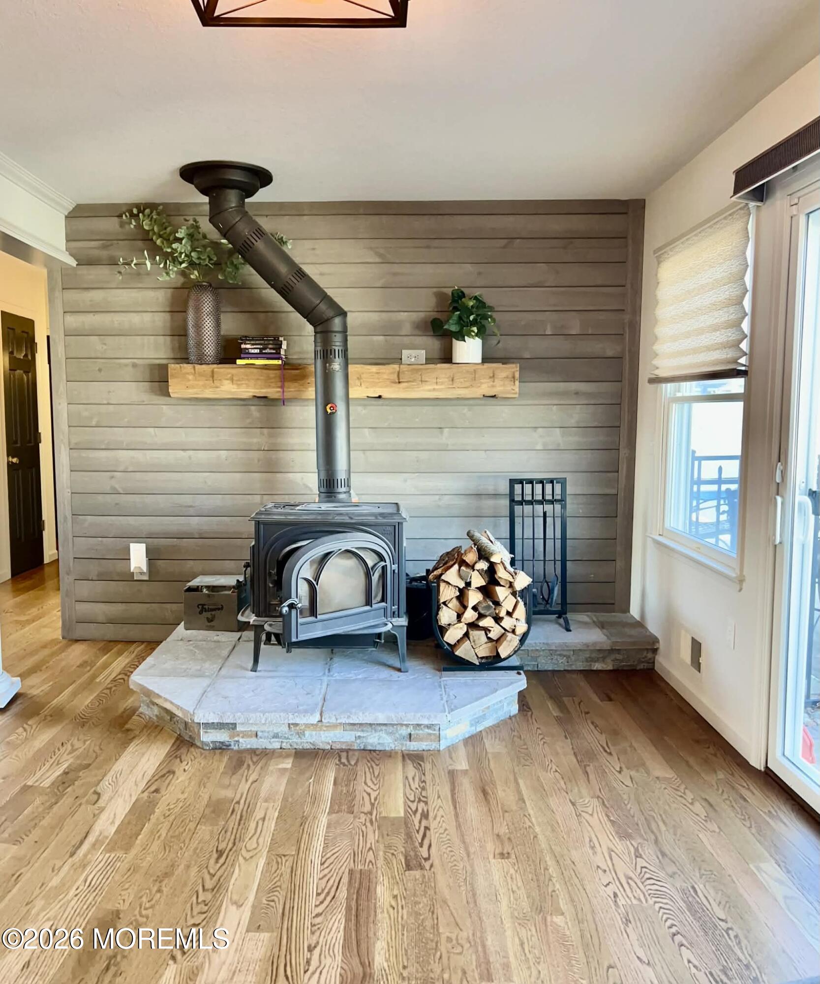820 Elwood Street Forked River, NJ 08731 - Photo 48 of 52 Cast Iron Stove Ship lap back splash!