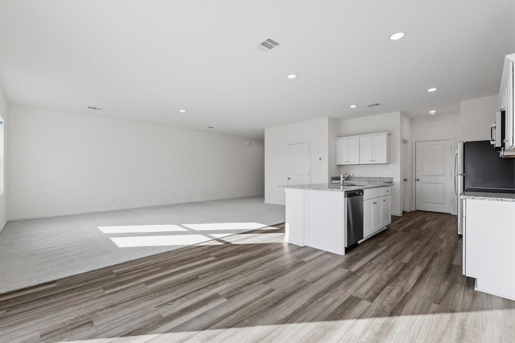 2018 Prairie Lane Melissa, TX 75454 - Photo 40 of 40 a view of kitchen with wooden floor