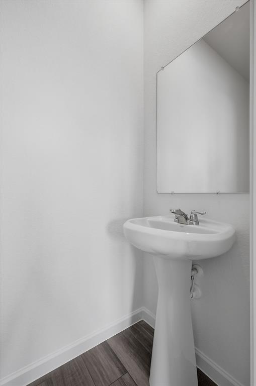 2018 Prairie Lane Melissa, TX 75454 - Photo 15 of 40 a bathroom with a sink and mirror