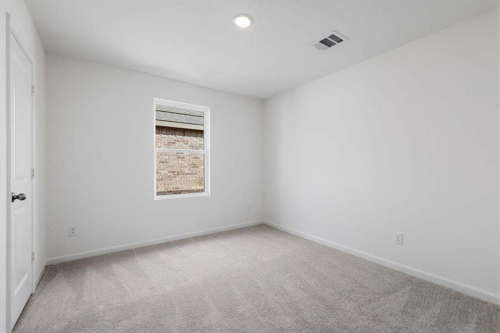 2018 Prairie Lane Melissa, TX 75454 - Photo 16 of 40 an empty room with a window