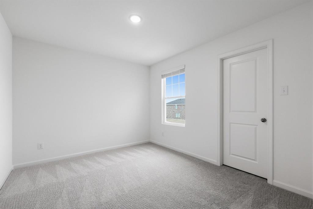 2018 Prairie Lane Melissa, TX 75454 - Photo 23 of 40 an empty room with a window
