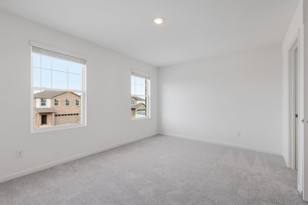 2018 Prairie Lane Melissa, TX 75454 - Photo 25 of 40 an empty room with windows