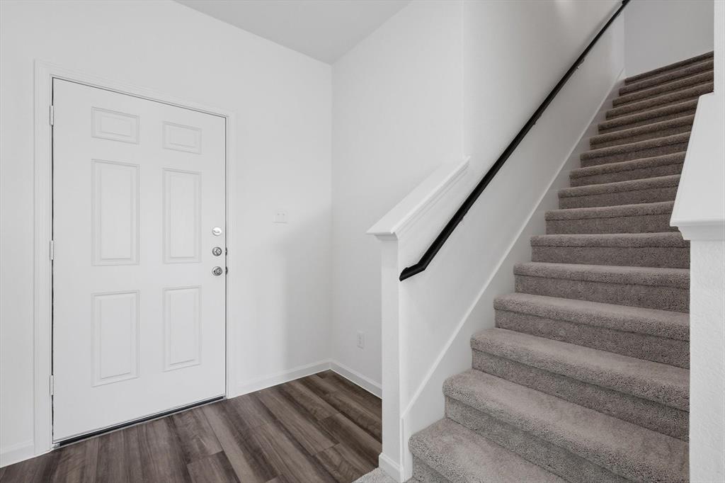 2018 Prairie Lane Melissa, TX 75454 - Photo 3 of 40 a view of entryway with wooden floor