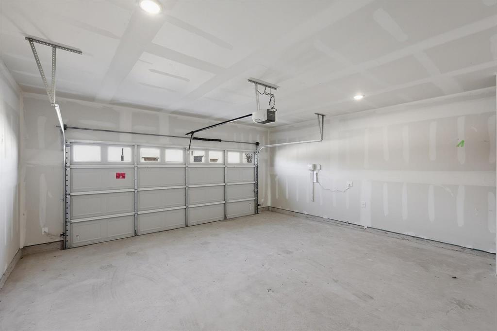 2018 Prairie Lane Melissa, TX 75454 - Photo 32 of 40 a view of a garage