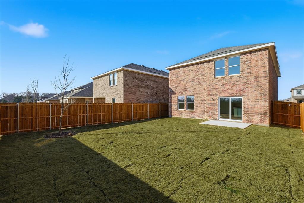 2018 Prairie Lane Melissa, TX 75454 - Photo 36 of 40 a view of a backyard of the house