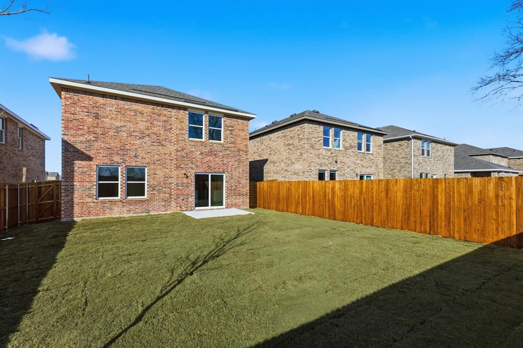 2018 Prairie Lane Melissa, TX 75454 - Photo 37 of 40 a front view of a house with a yard