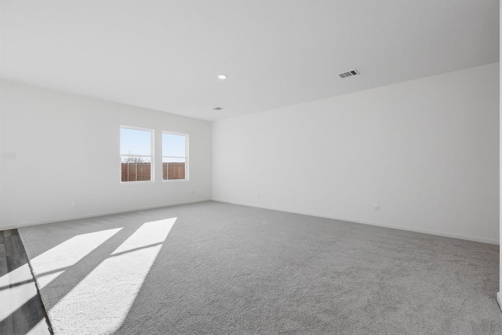 2018 Prairie Lane Melissa, TX 75454 - Photo 6 of 40 an empty room with windows