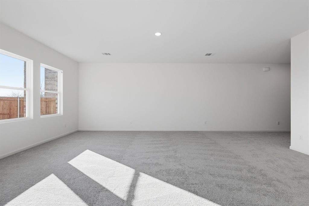 2018 Prairie Lane Melissa, TX 75454 - Photo 9 of 40 a view of an empty room with a window