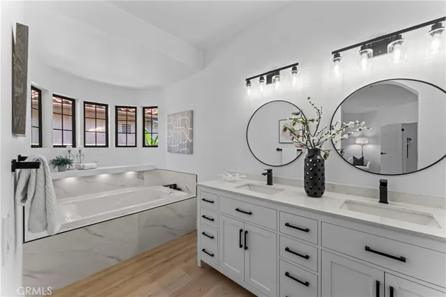 a bedroom with a bed and a chair