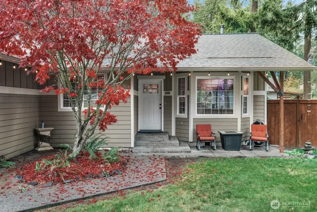 a front view of a house with garden