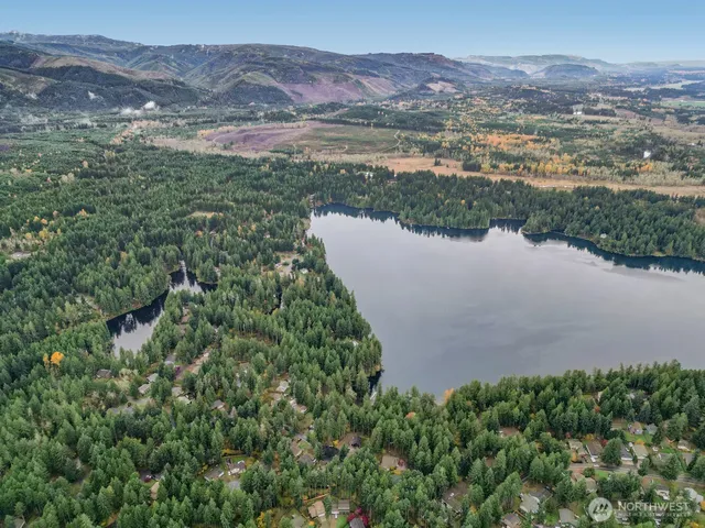 a view of a lake with mountains in the background