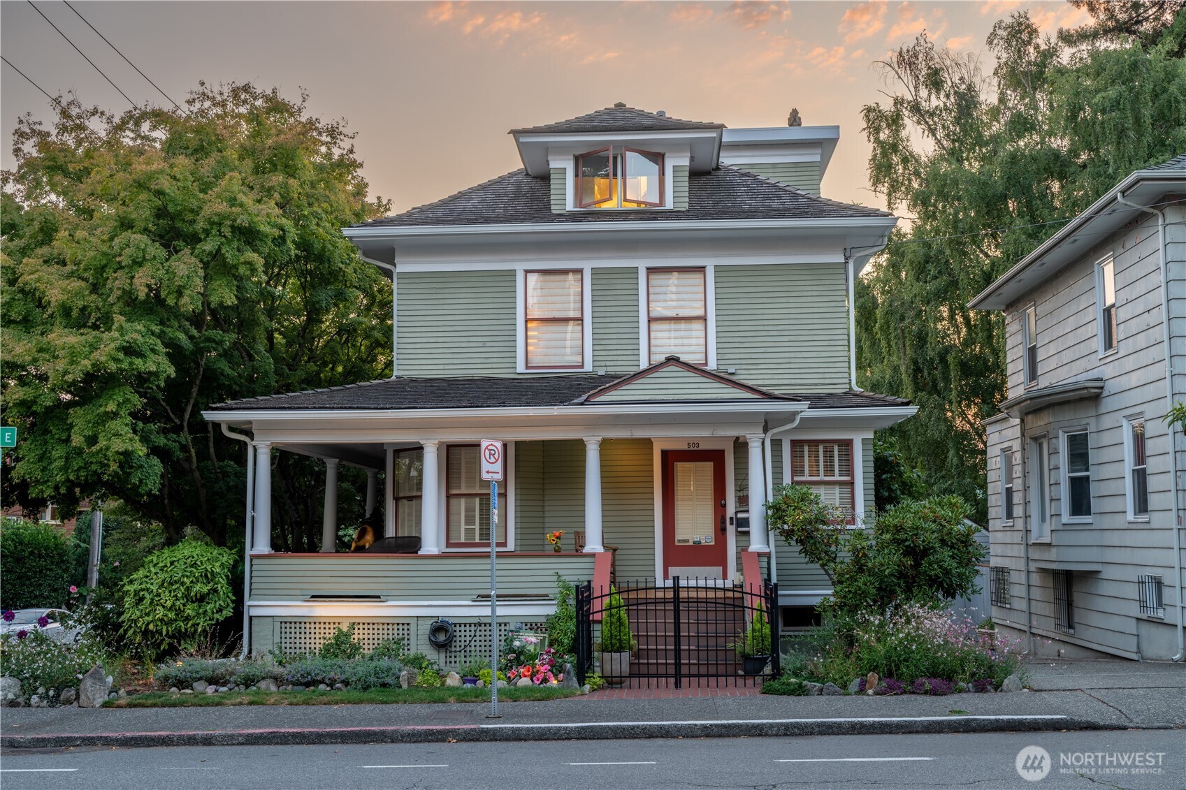 503 12th Avenue East Seattle, WA 98102 - Photo 1 of 1 a front view of a house with a yard