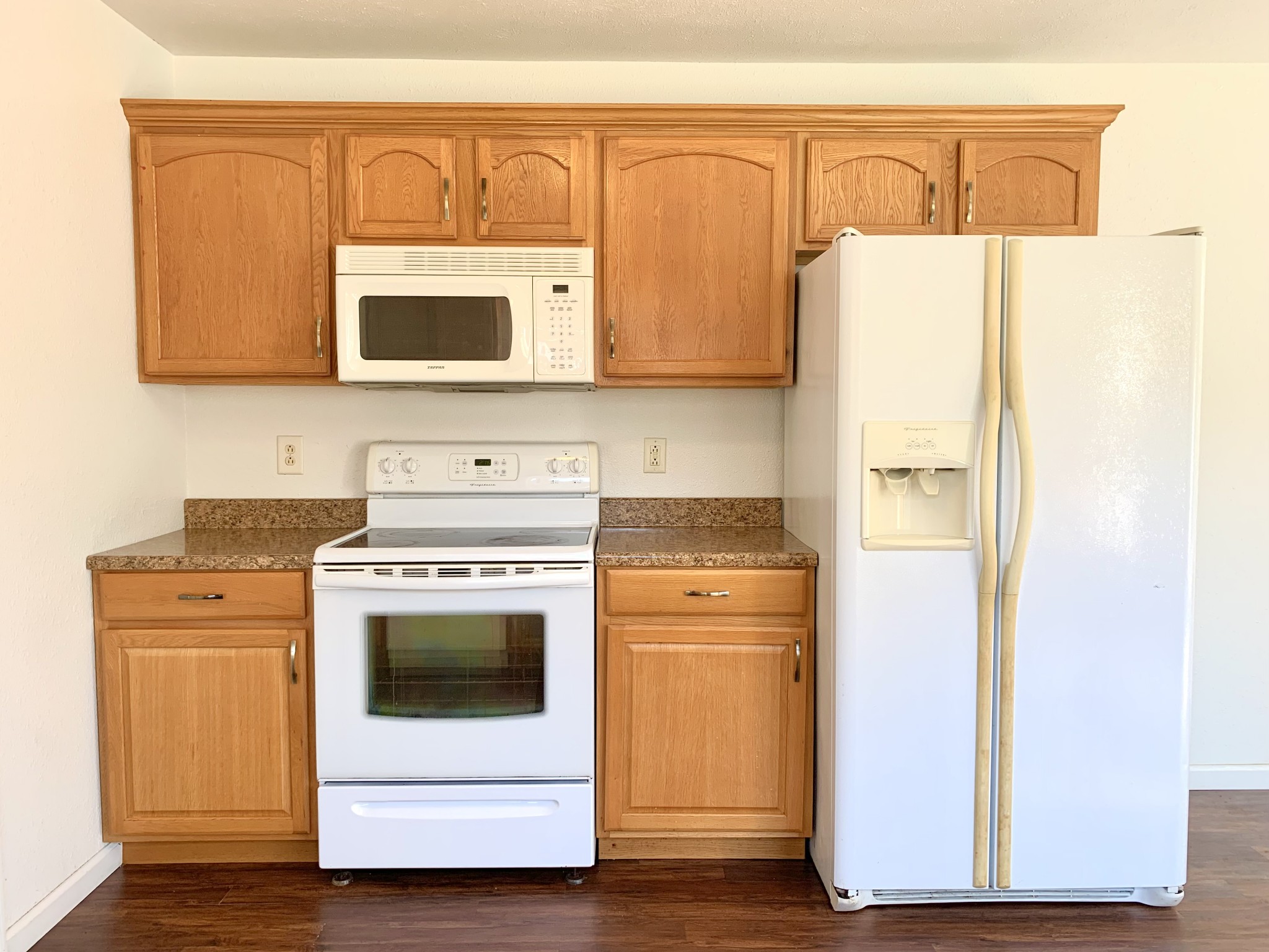 10543 Bell Station Road Oak Grove, KY 42262 - Photo 12 of 41 a kitchen with a stove a sink and a refrigerator