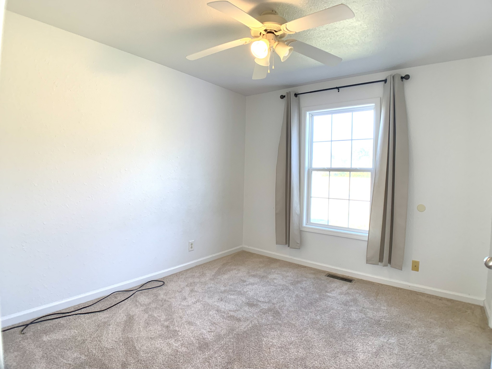 10543 Bell Station Road Oak Grove, KY 42262 - Photo 16 of 41 an empty room with a window