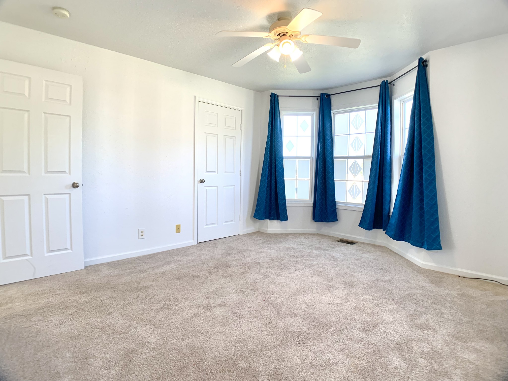10543 Bell Station Road Oak Grove, KY 42262 - Photo 21 of 41 an empty room with windows and closet