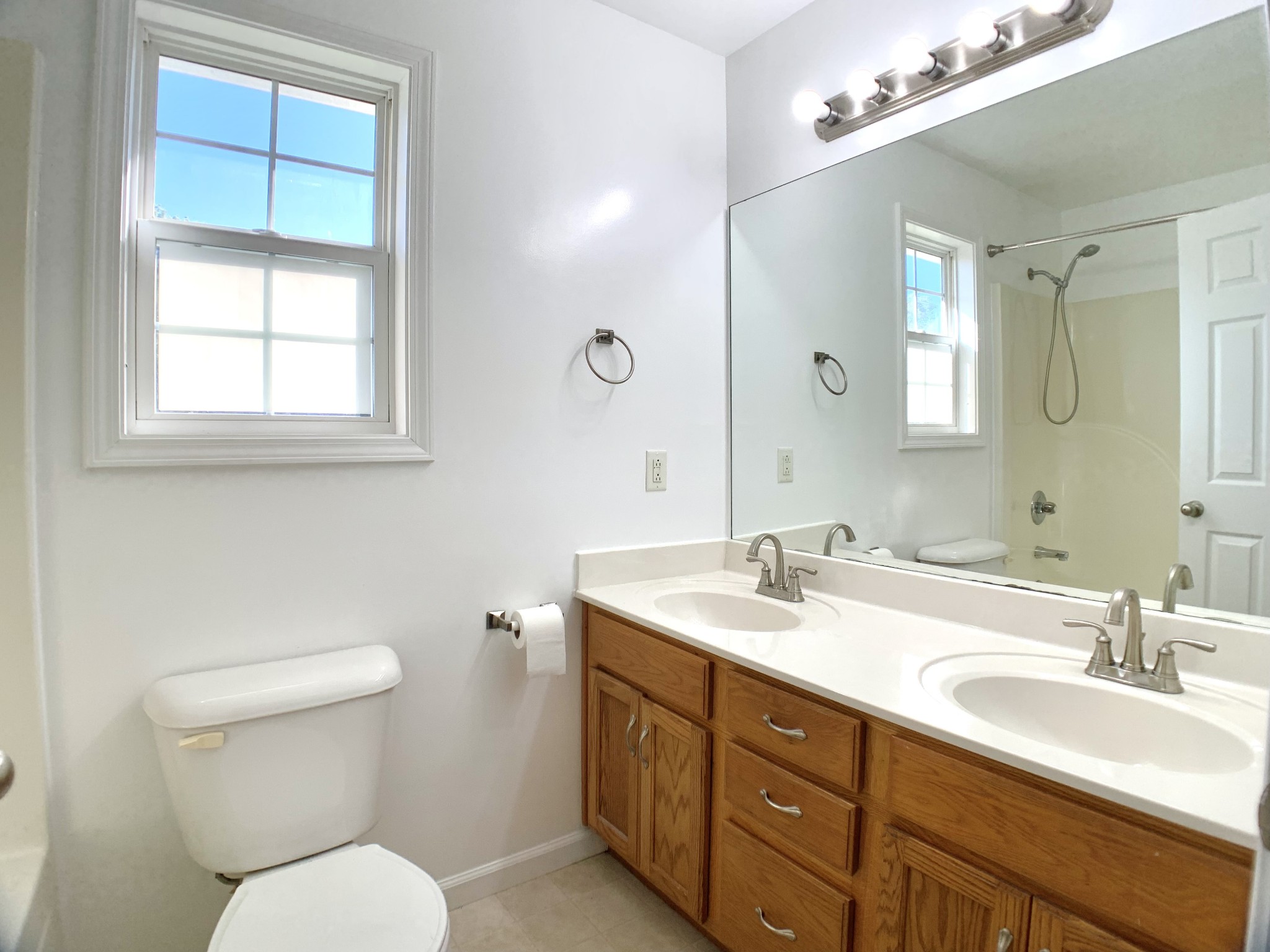 10543 Bell Station Road Oak Grove, KY 42262 - Photo 26 of 41 a bathroom with a toilet a sink and mirror