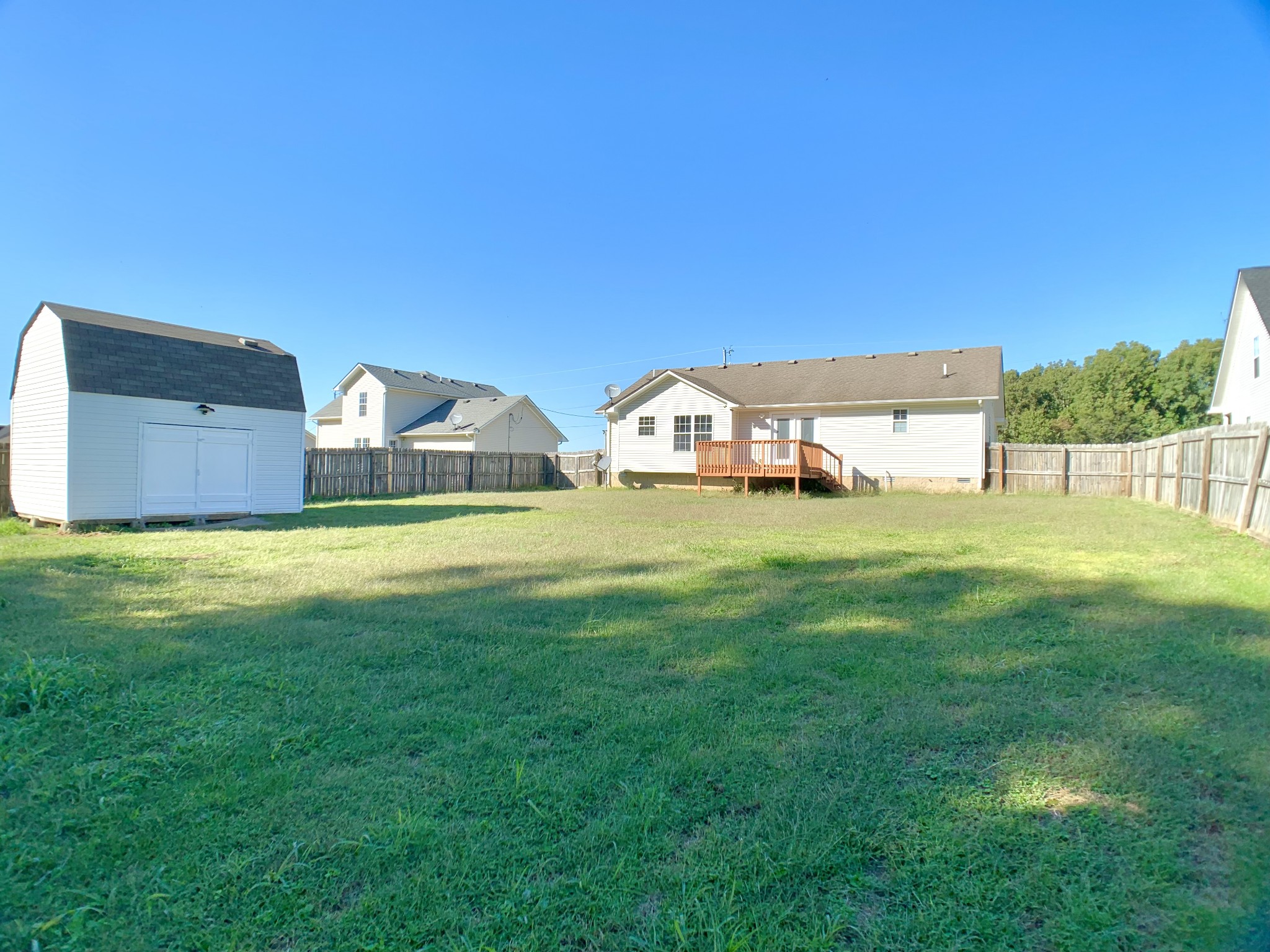 10543 Bell Station Road Oak Grove, KY 42262 - Photo 34 of 41 a view of a house with a big yard and large trees