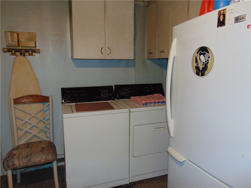 5569 Aiken Road McKees Rocks, PA 15136 - Photo 12 of 24 a utility room with dryer and washer