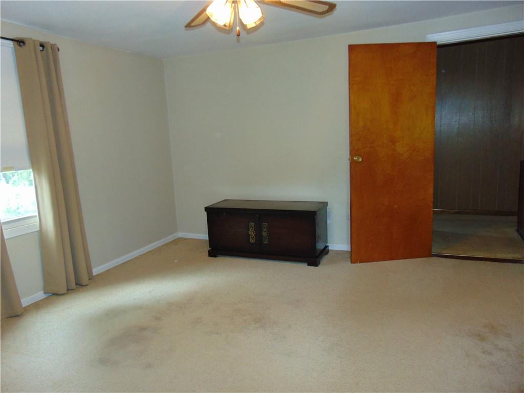 5569 Aiken Road McKees Rocks, PA 15136 - Photo 19 of 24 a view of an empty room with a window