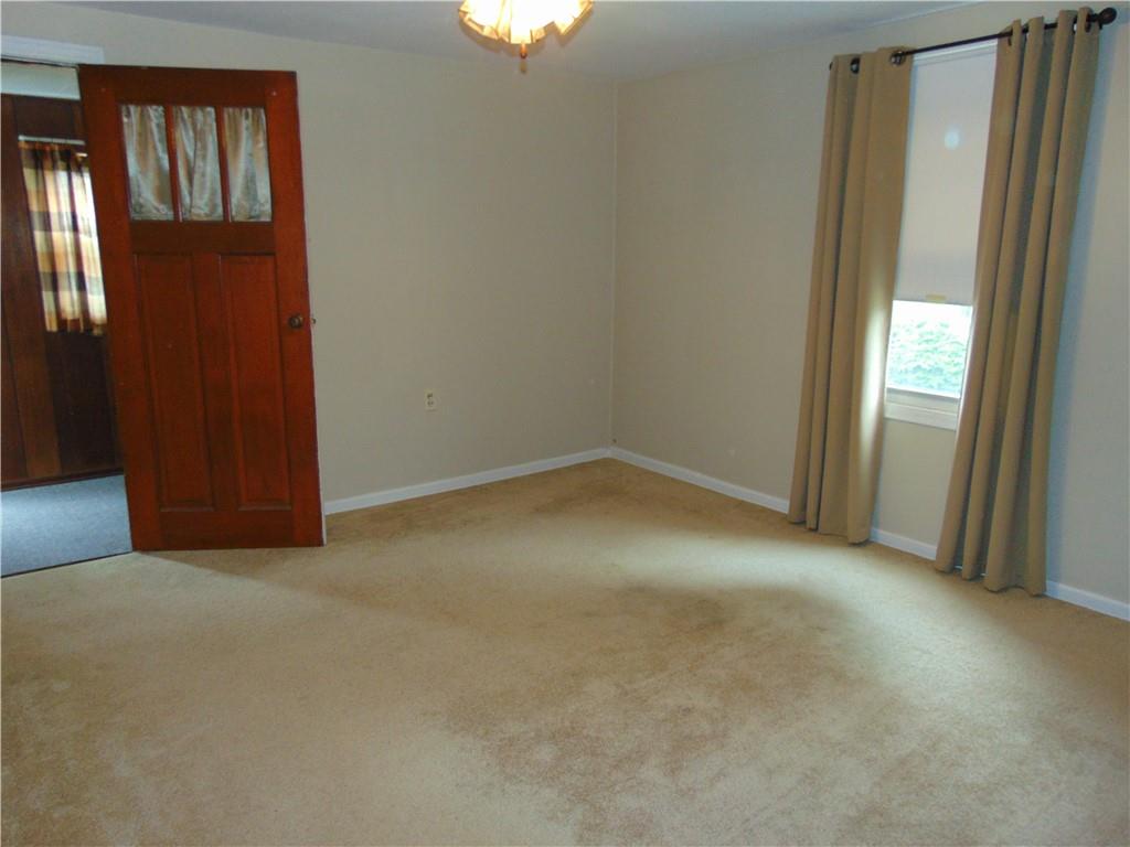 5569 Aiken Road McKees Rocks, PA 15136 - Photo 20 of 24 an empty room with windows
