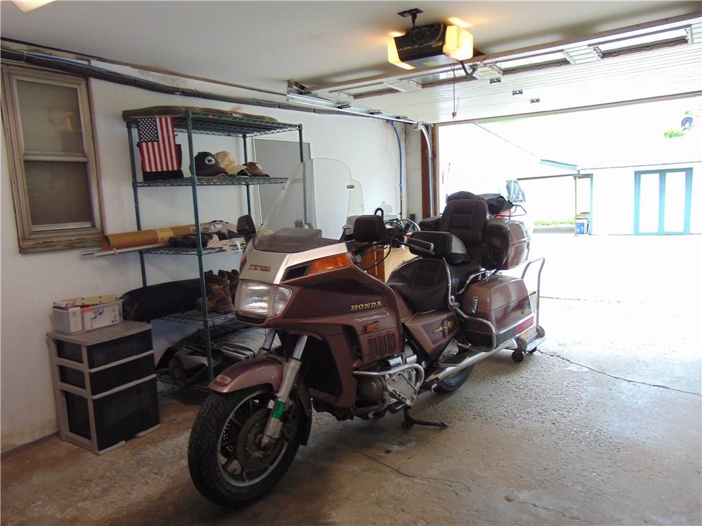 5569 Aiken Road McKees Rocks, PA 15136 - Photo 23 of 24 a car is parked in a garage