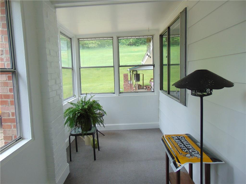 5569 Aiken Road McKees Rocks, PA 15136 - Photo 6 of 24 a workspace with furniture and a window