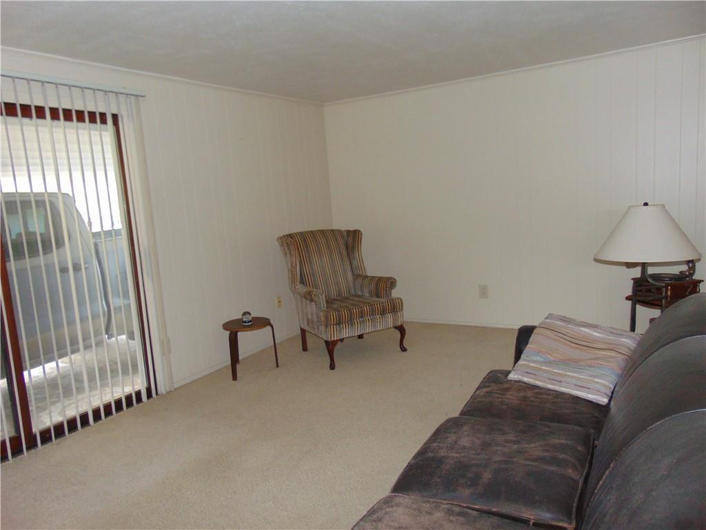 5569 Aiken Road McKees Rocks, PA 15136 - Photo 7 of 24 a living room with furniture and a window