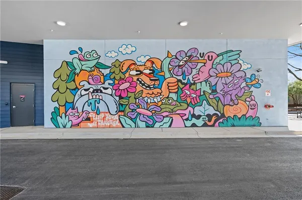 an outdoor space with a lot of flowers