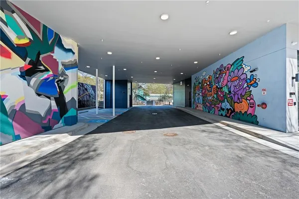 a view of a hallway with workspace