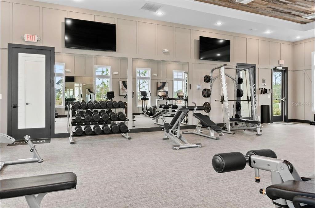 462 Hillendale Circle St. Johns, FL 32259 - Photo 44 of 45 a view of a livingroom with workspace and a flat screen tv