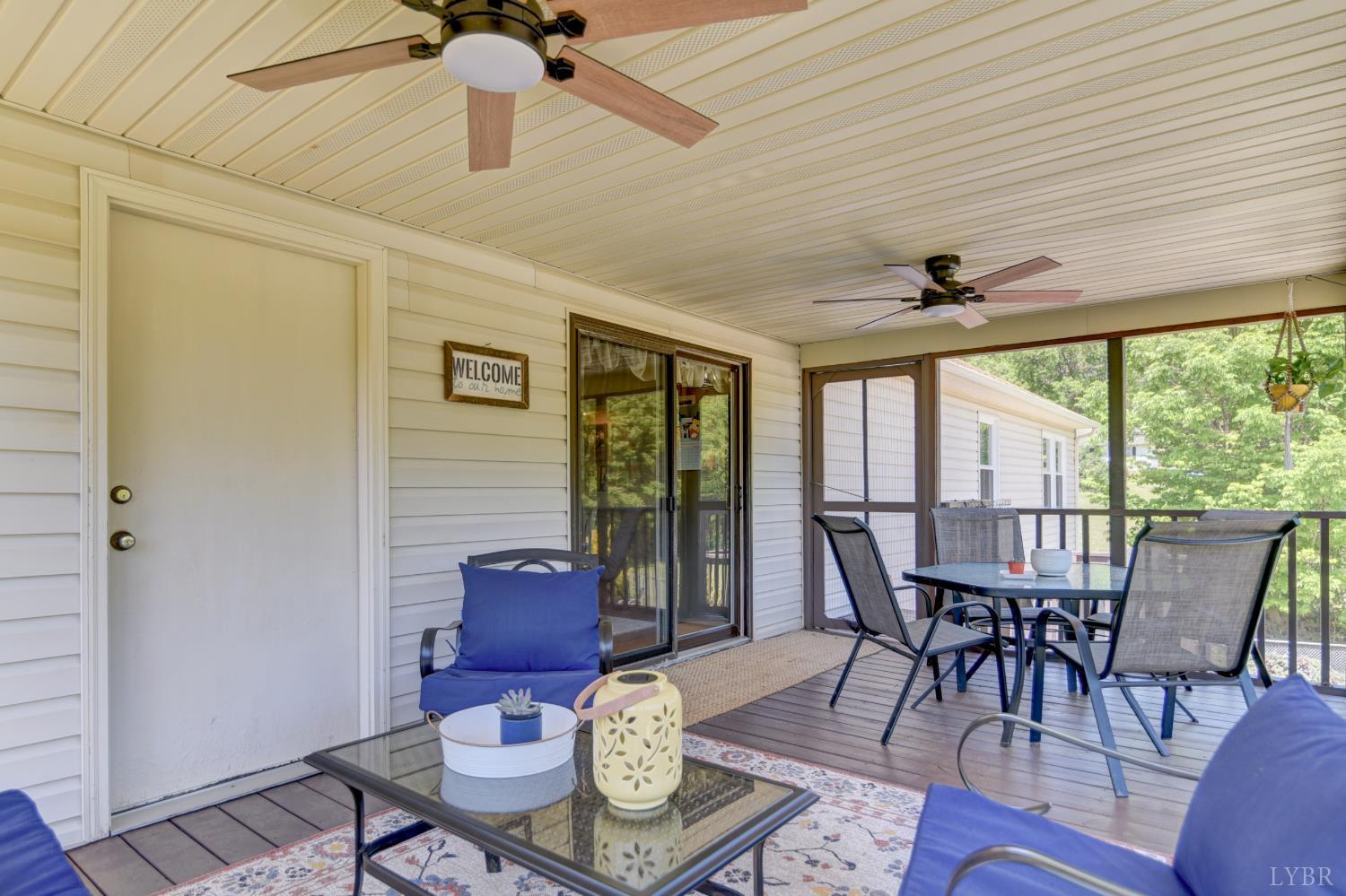 151 Anderson Place Rustburg, VA 24588 - Photo 12 of 57 a view of a dining room with furniture window and outside view