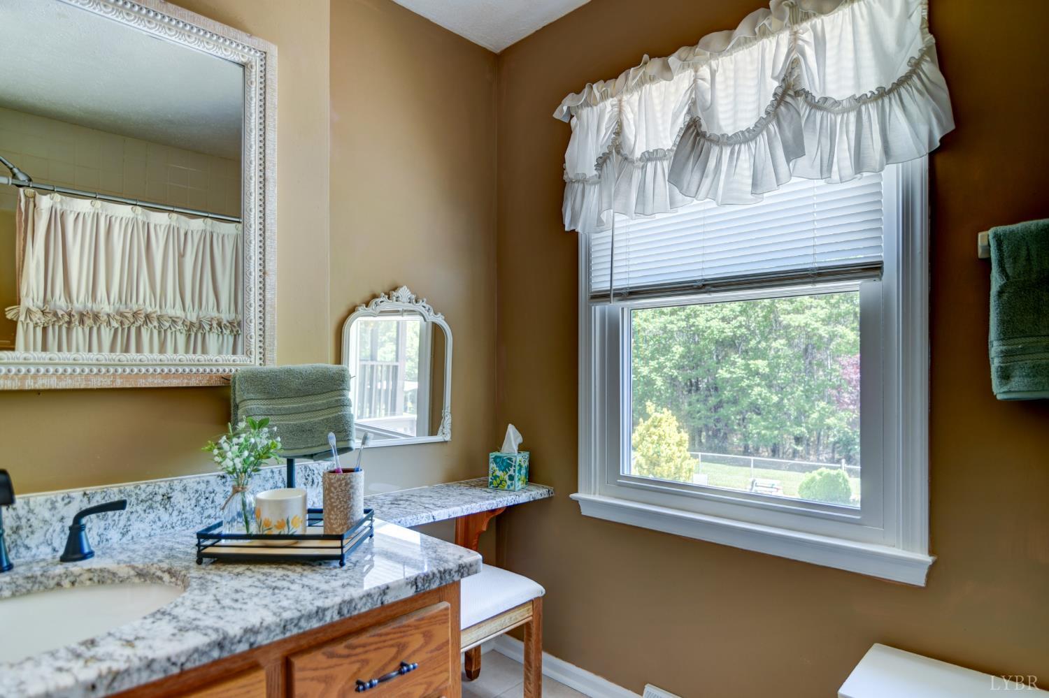 151 Anderson Place Rustburg, VA 24588 - Photo 16 of 57 a dining room with granite countertop furniture and a fireplace