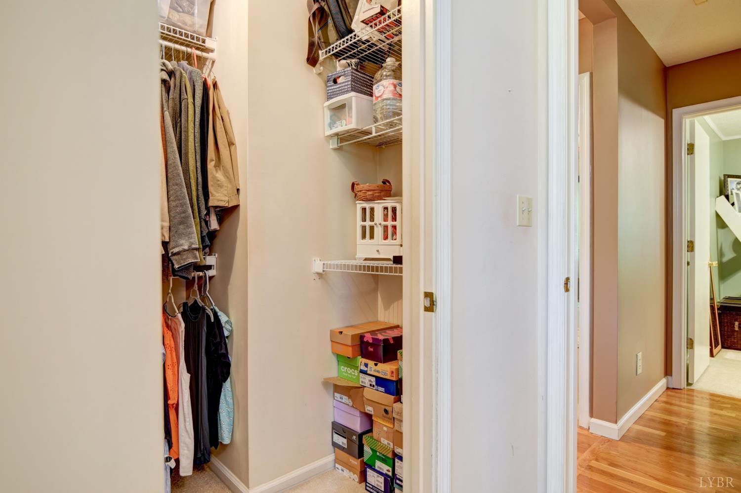 151 Anderson Place Rustburg, VA 24588 - Photo 19 of 57 a view of walk in closet with clothes and shoes