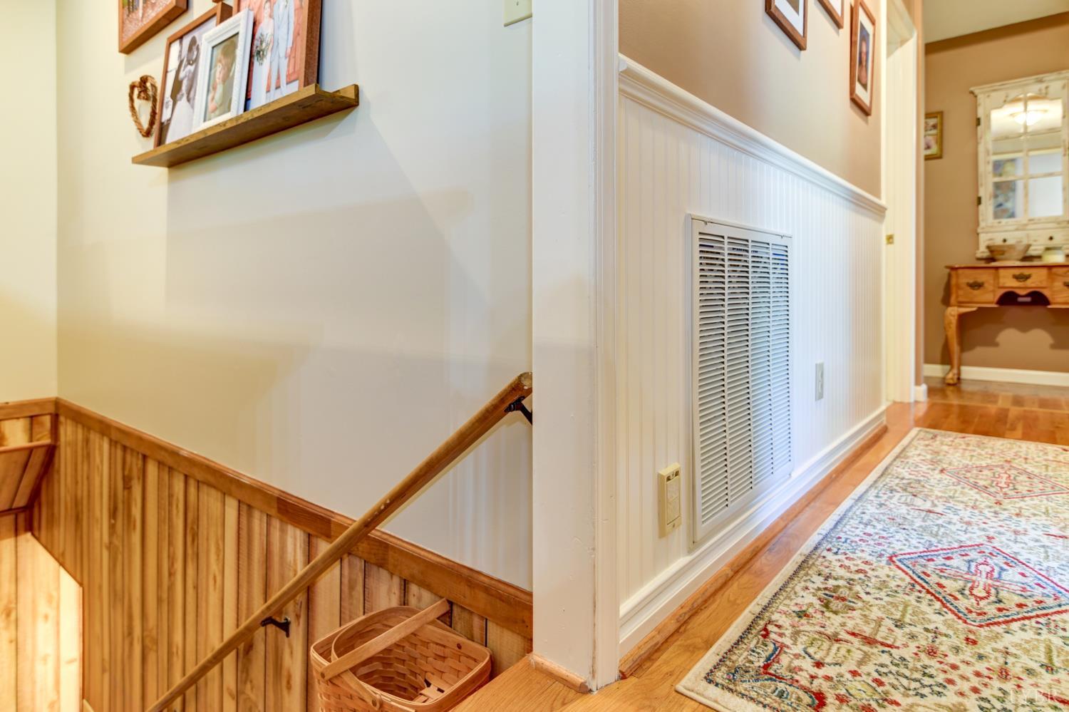 151 Anderson Place Rustburg, VA 24588 - Photo 27 of 57 a view of a hallway with wooden floor and staircase