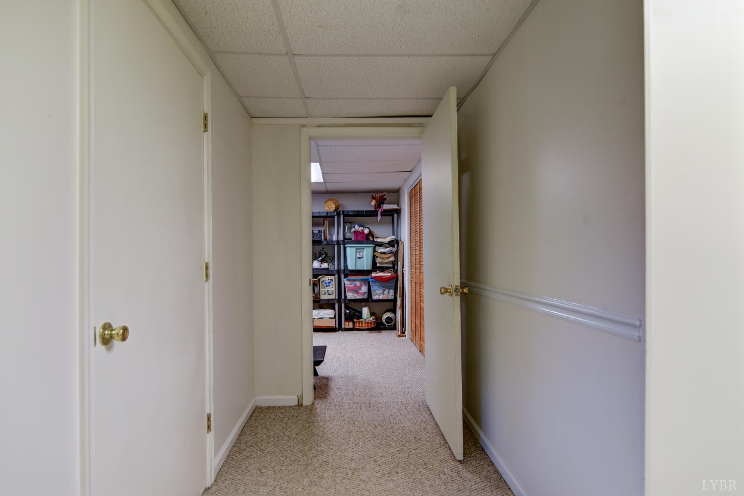 151 Anderson Place Rustburg, VA 24588 - Photo 33 of 57 a view of a closet area with living room